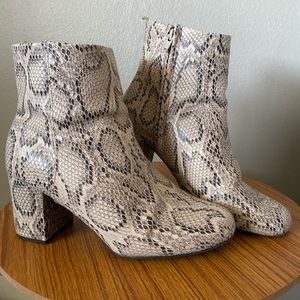 Snakeskin heeled booties